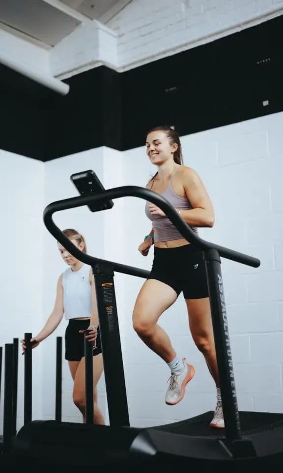 Girl running inside gym